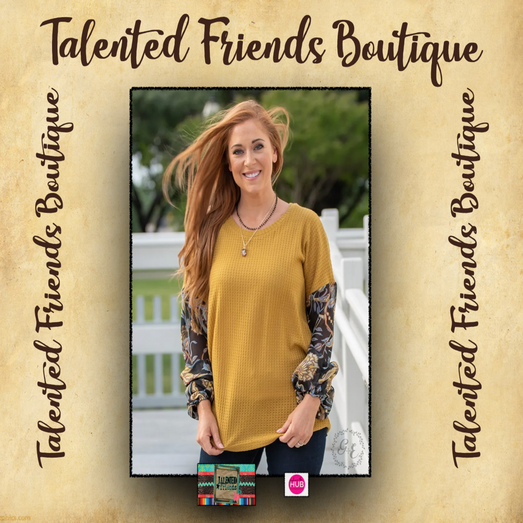 This top is perfect for starting your week! It's so easy to throw this cutie on with your favorite jeans or leggings and go!  Mustard waffle knit body with off the shoulder seams Sleeves are a paisley print with cuff Super soft! Super Cute! Also available in Sage! 